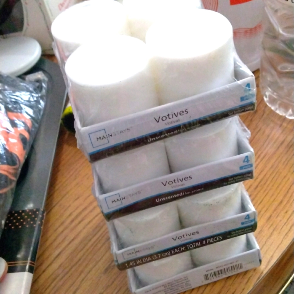 Set of 4 votive candles new